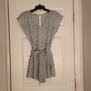 She + Sky black and white romper. Size Large, back zipper romper with pockets.